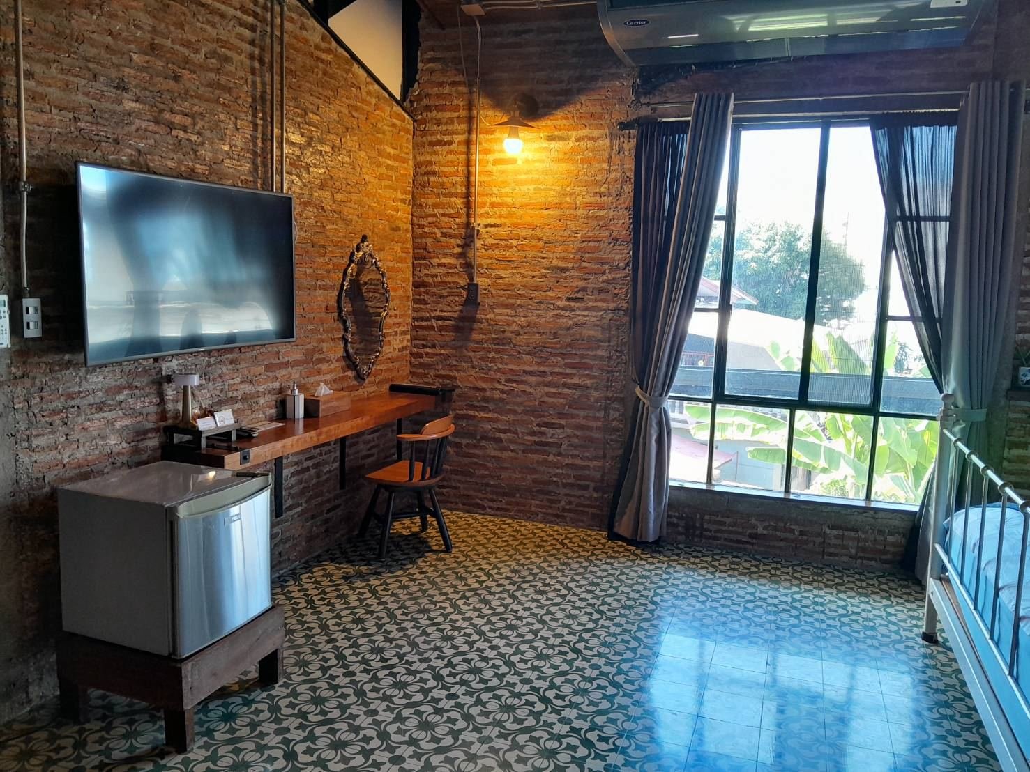 Family Room with TV wall and tall window