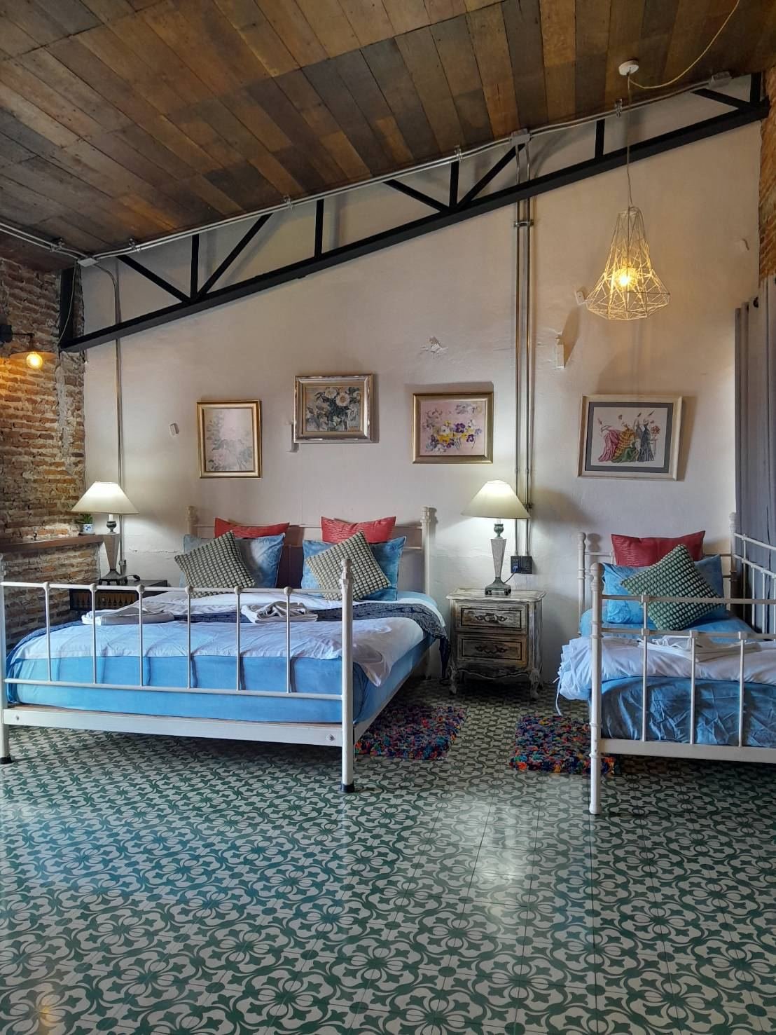 Family Room beds under a steel truss