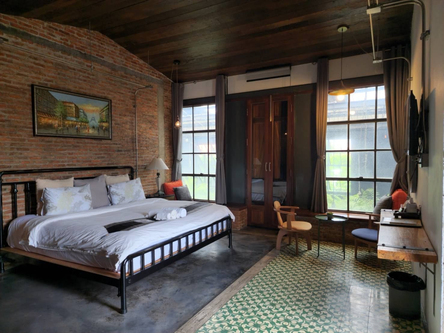 Superior Loft with king bed and tall windows
