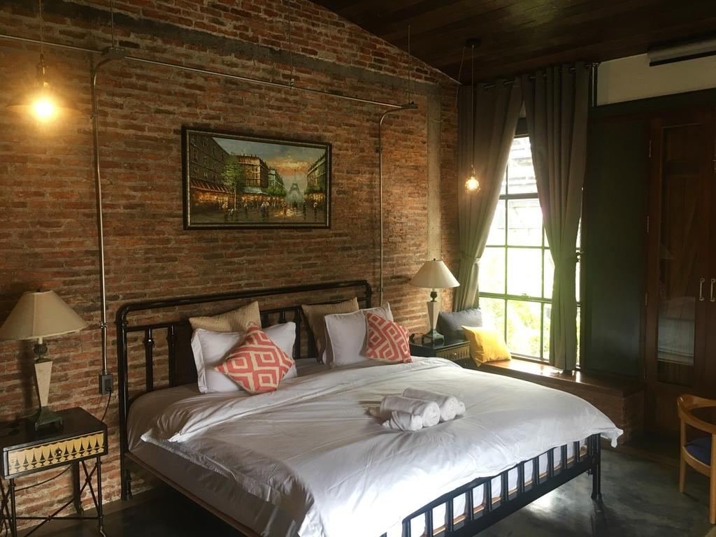 Superior Loft king bed with lamps