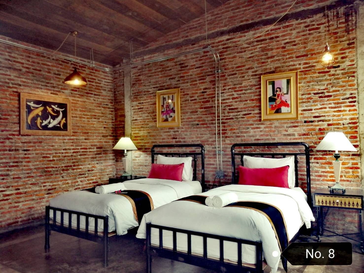 Twin beds in room No. 8