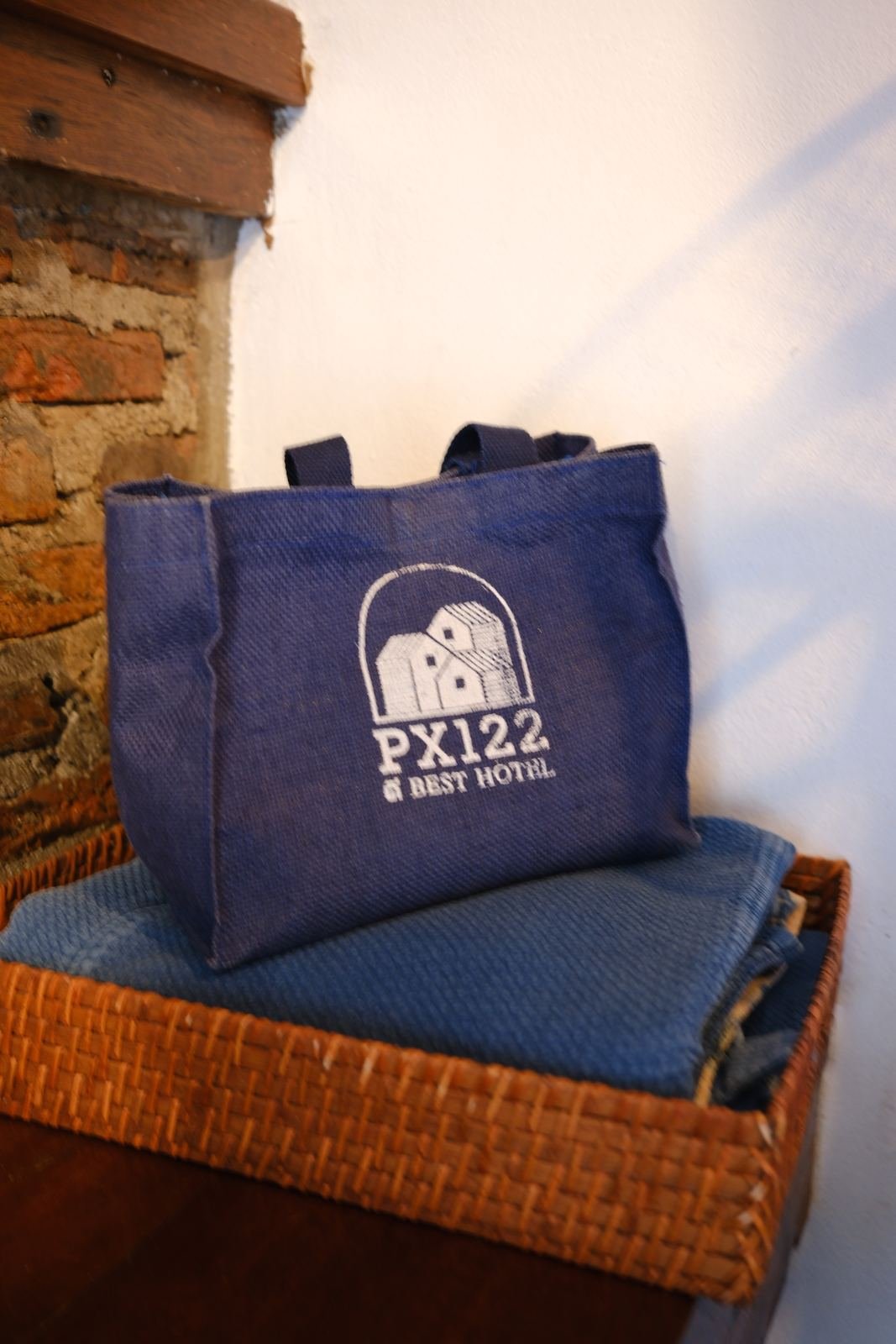 PX122 denim tote bag in a woven basket